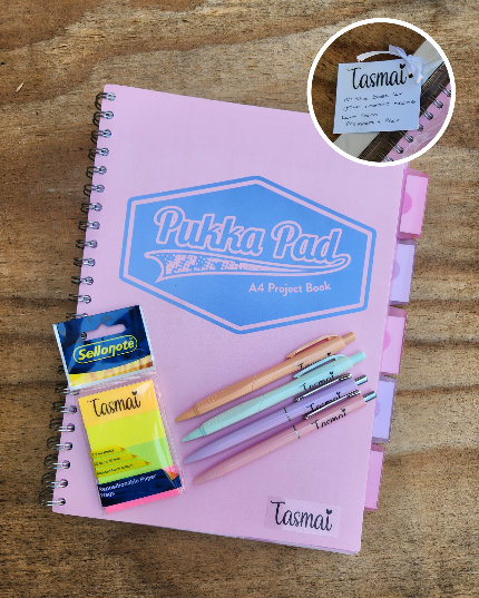 A personalised exam Study Pack with a project book and pens